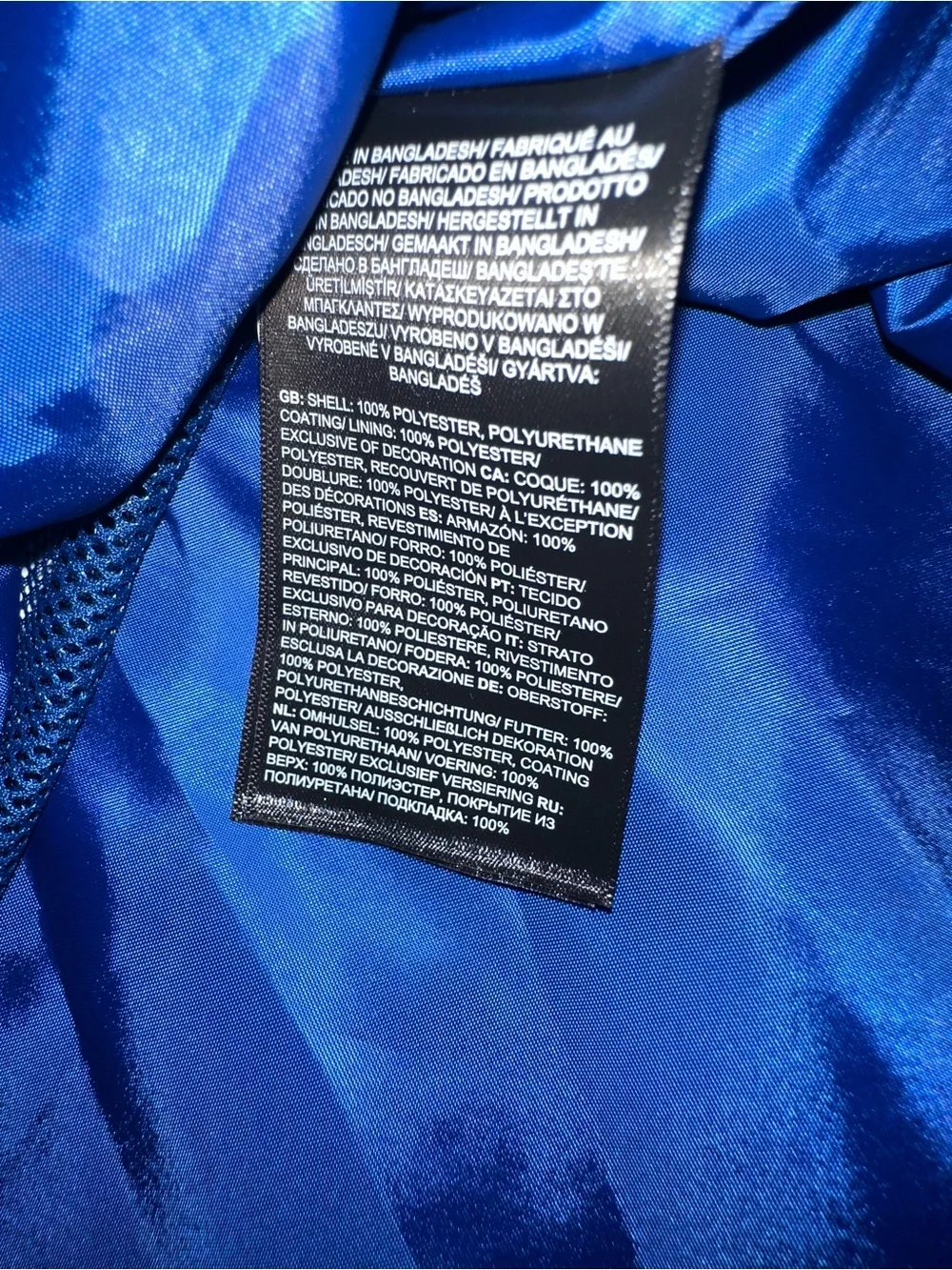 The North Face Blue and Black Hooded Rain Jacket